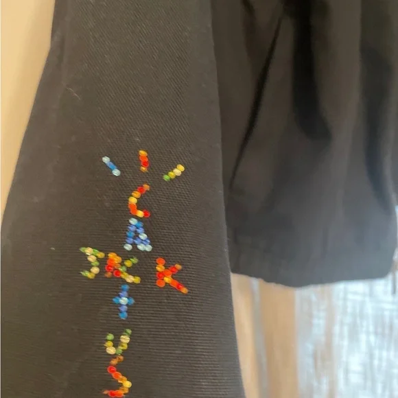 Nike Black Jacket with Red Flame Graphic